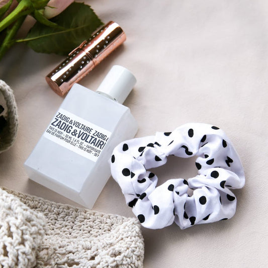 White polka dot cotton scrunchie — matching hair accessory styled with Celeste loungewear set