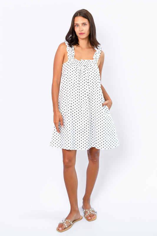 Mila Milk front view — cotton summer dress with slim shoulder straps and polka dot print