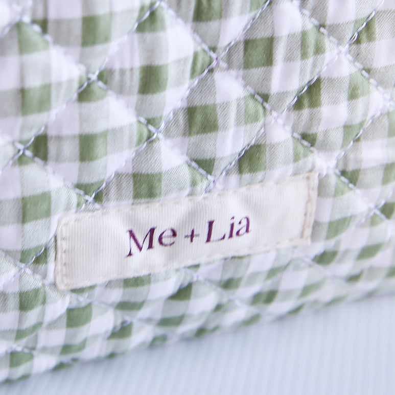 Gingham Matcha Make-up Bag Large — green gingham cotton travel bag held in hand