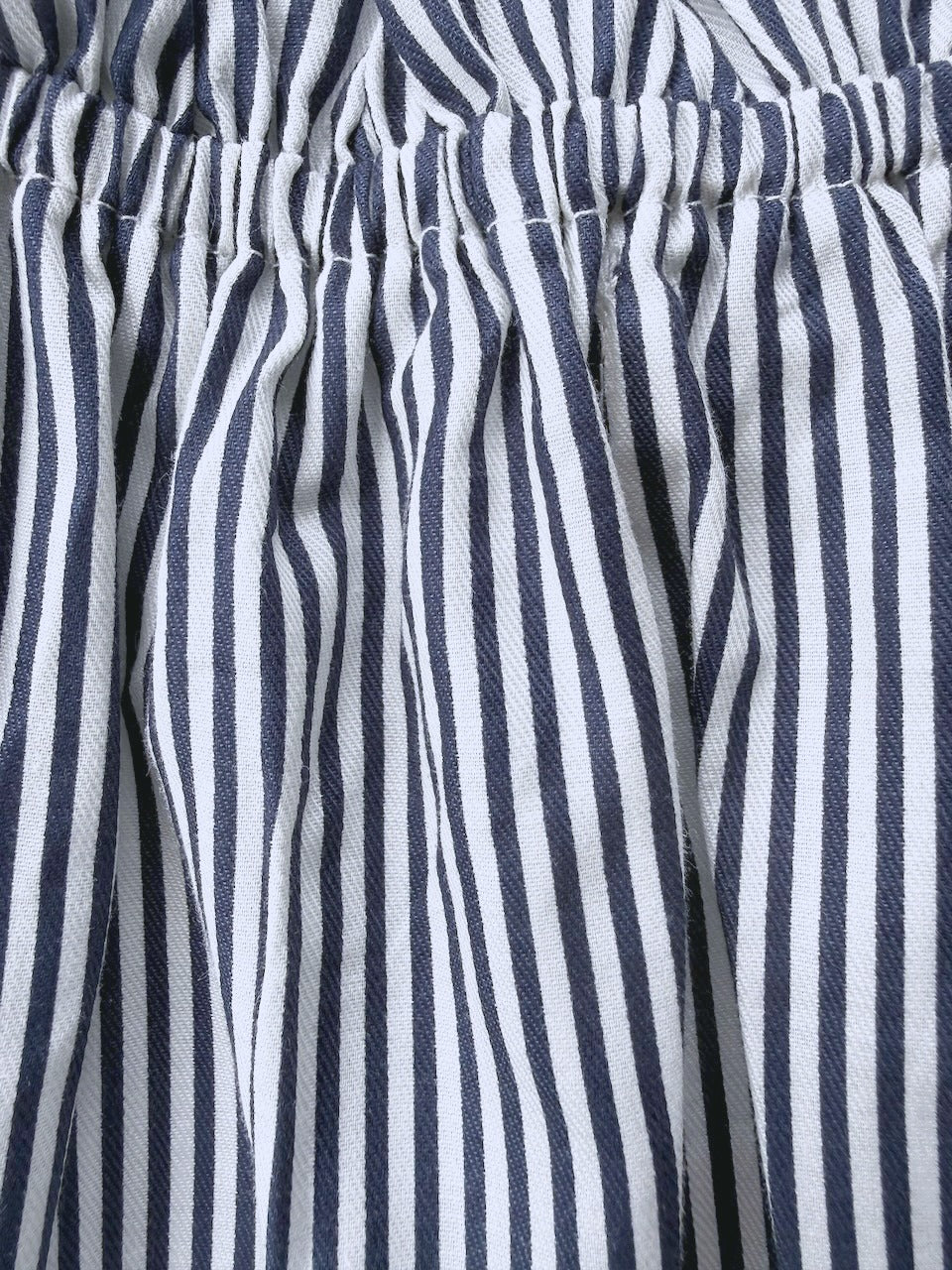 Martina Midnight fabric detail — navy pinstripe print on 100% premium cotton