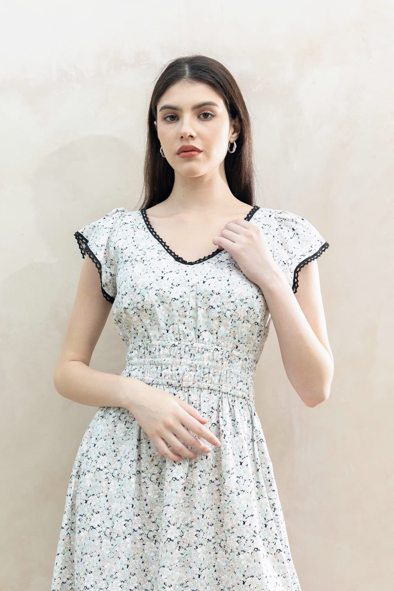 Juliet Black Blossom side view — flutter sleeve cotton midi dress with deep side pockets