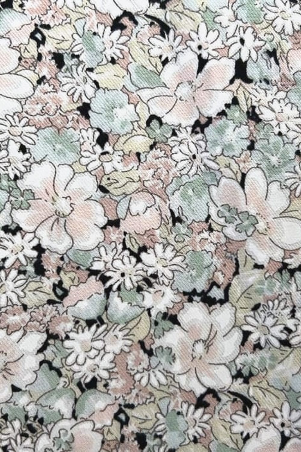 Juliet Black Blossom neckline detail — flutter sleeves and contrast lace trim on black floral cotton