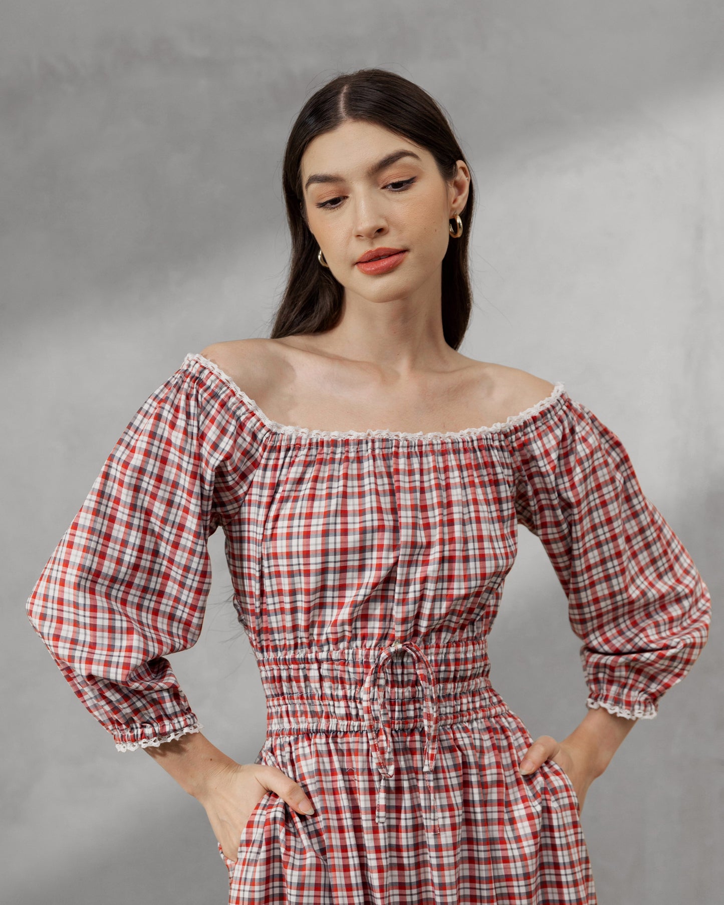 Siena Scarlet lifestyle — women's red plaid cotton dress styled for slow living and travel