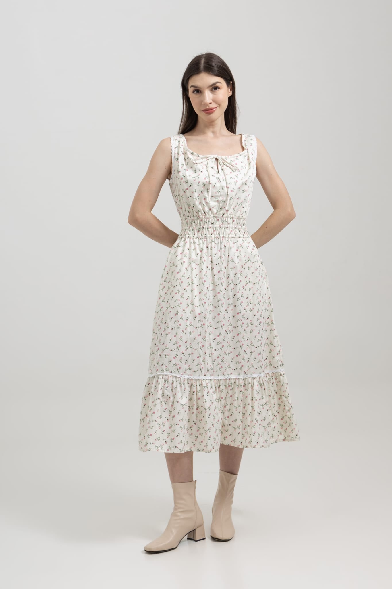 Bianca Cloud Rose side view — flowing tiered midi dress with elasticated waist