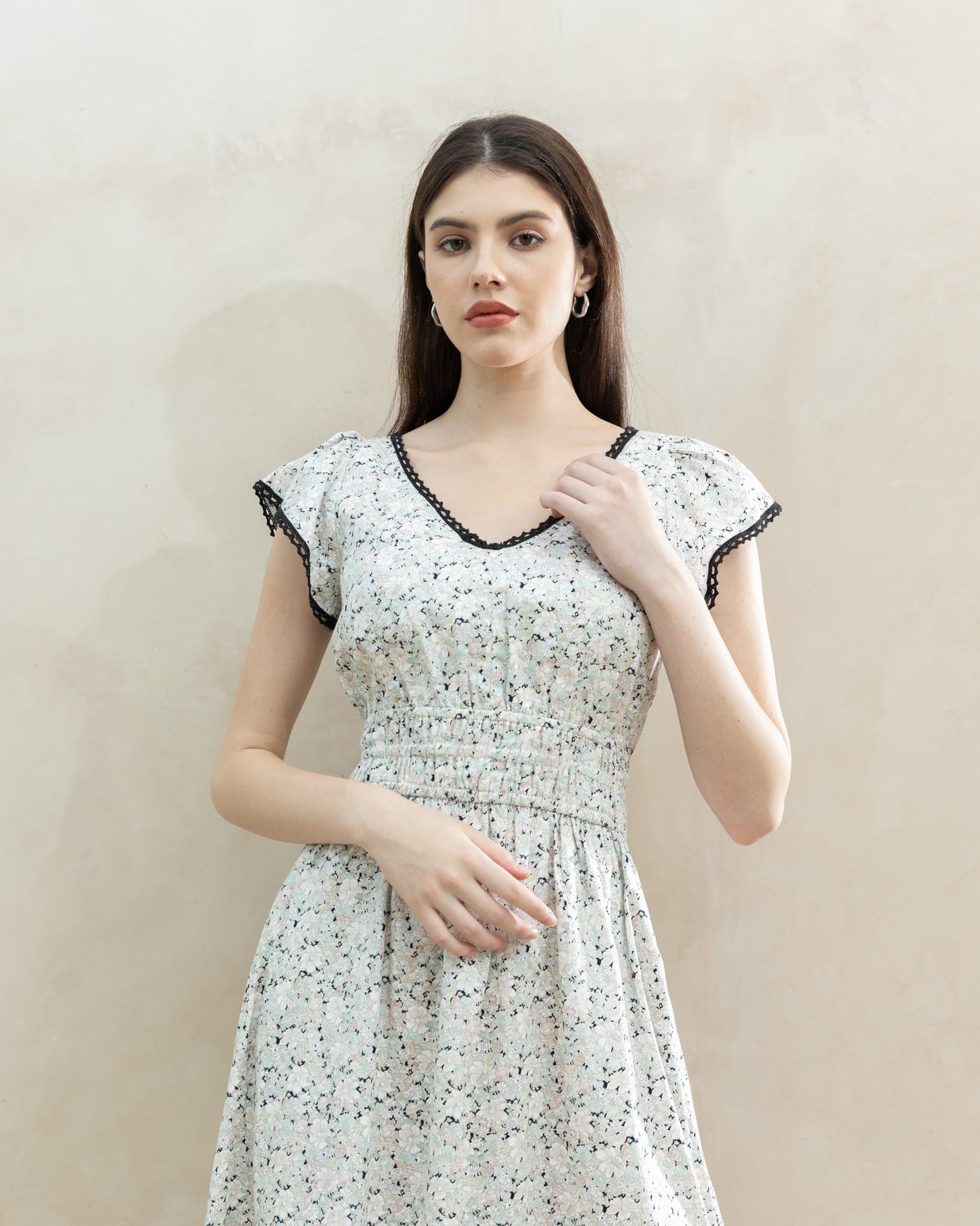 Juliet Black Blossom side view — flutter sleeve cotton dress with deep side pockets