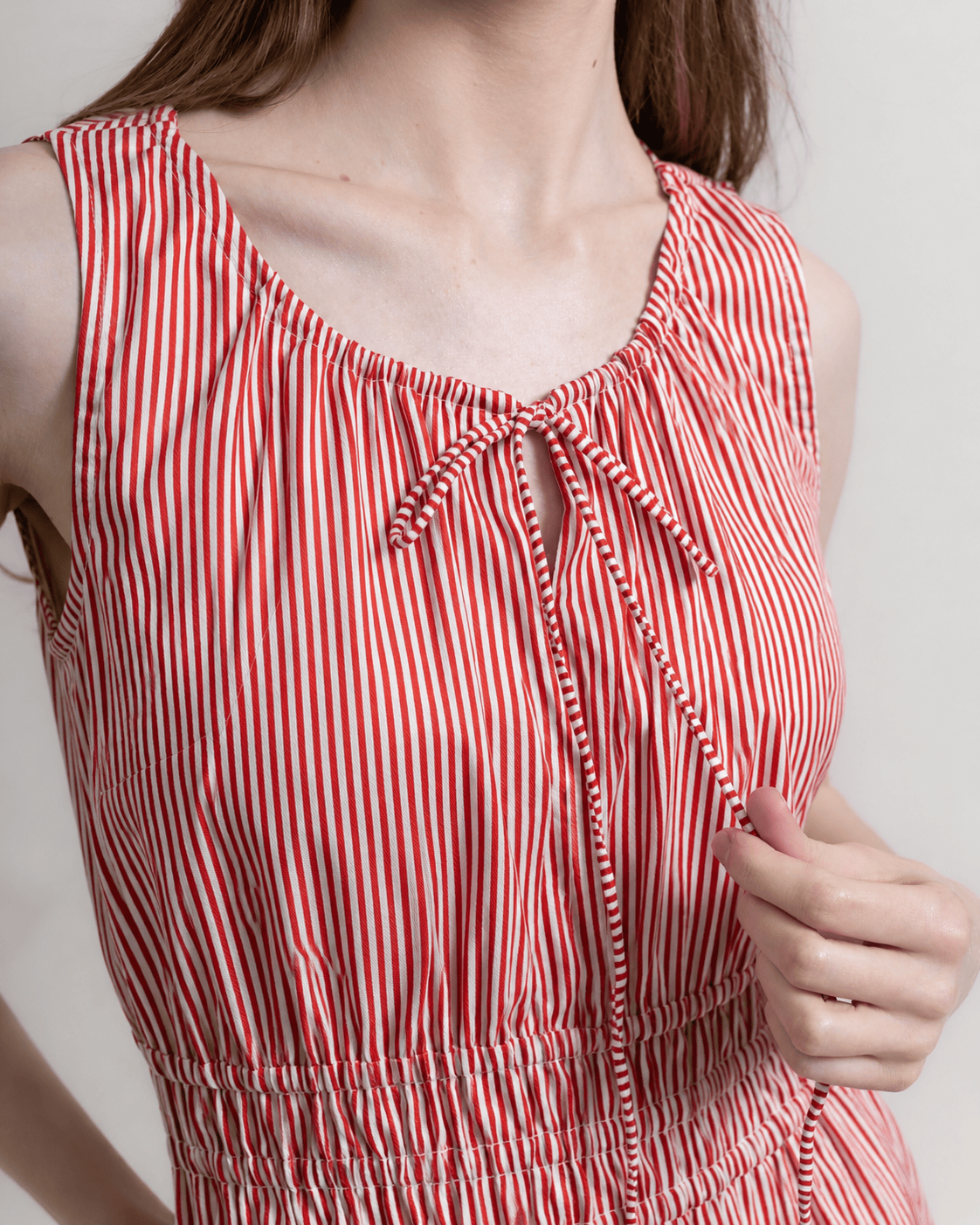 Martina Red neckline detail — soft scoop neckline on pinstripe cotton dress