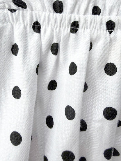 Mila Milk detail — white polka dot print on 100% premium cotton