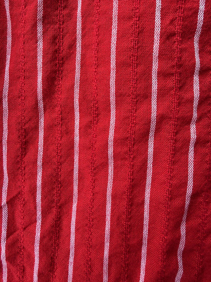 Valentina Scarlet lifestyle — women's scarlet red cotton dress styled for travel and slow living