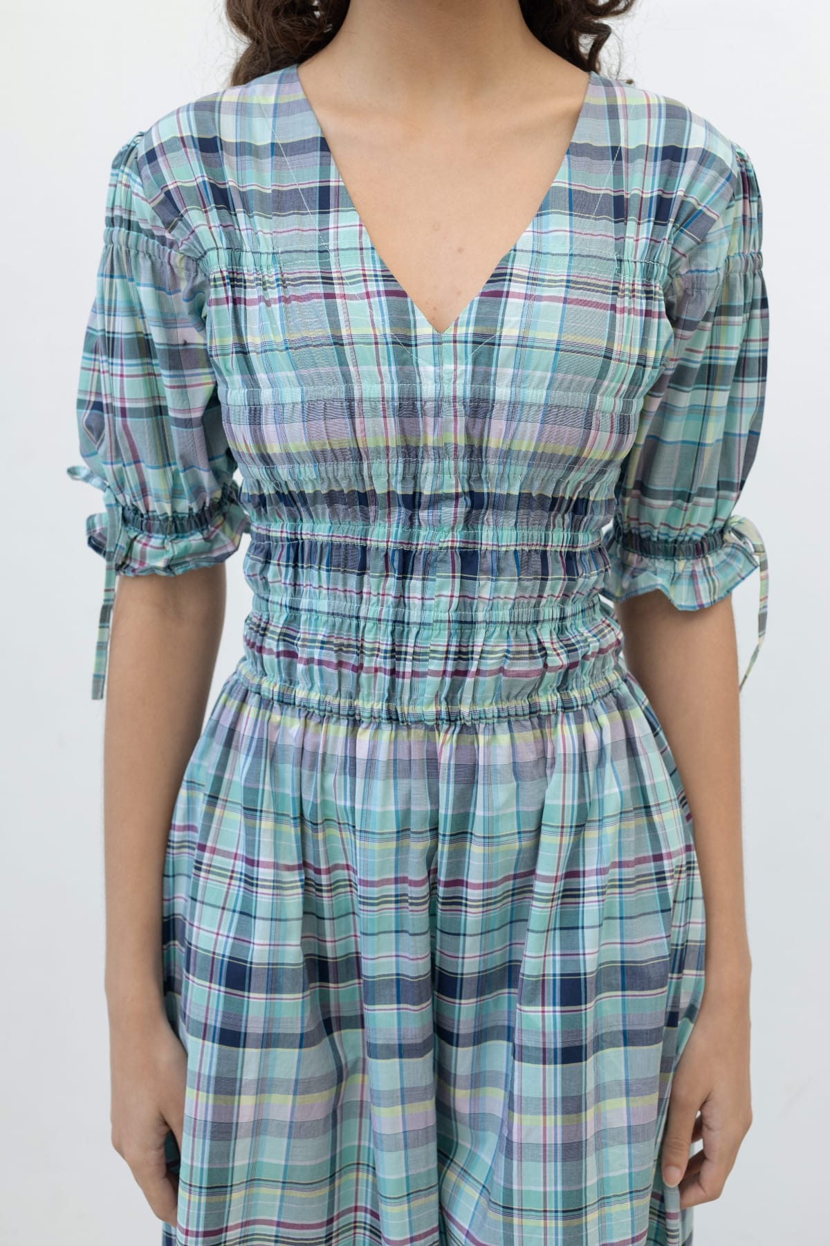 Clairo Meadow side view — plaid cotton midi dress with elasticated bodice and tiered skirt