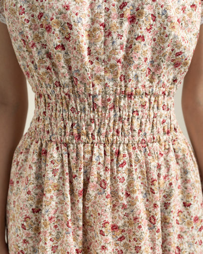 Juliet Wildflower waist detail — shirred elastic panel and gathered skirt on premium cotton