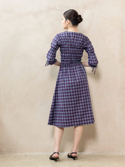 Tassia Plum back view — women's purple plaid daydream dress in premium cotton